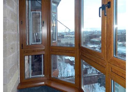 Французское остекление балкона профилем Veka с ламинированием под дерево в Пушкино