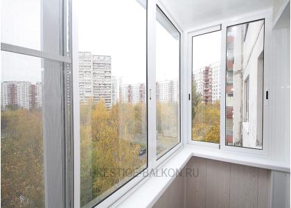 Холодное остекление балкона профилем Provedal с отделкой стен и потолка ламинированными панелями в Пушкино