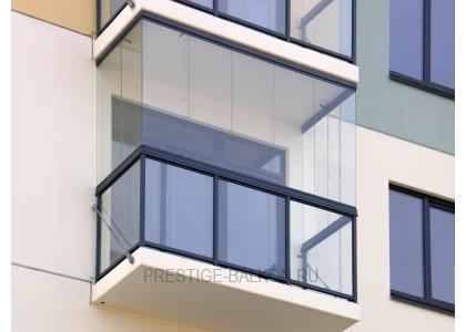 Безрамное остекление балкона с внешней отделкой в Пушкино