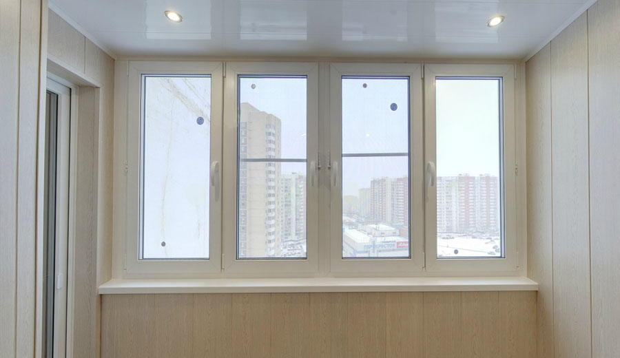 Тёплое остекление балкона профилем КВЕ и отделкой панелями ПВХ в Пушкино